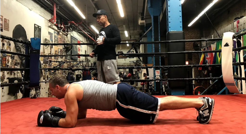 trainer and trainee in the ring